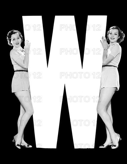 The Letter "W" And Two Women