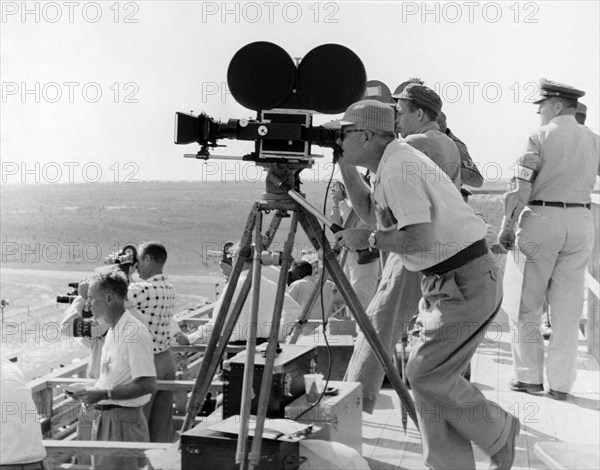 Photographers Filming An Event