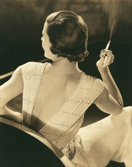 A Glamourous Woman Smoking