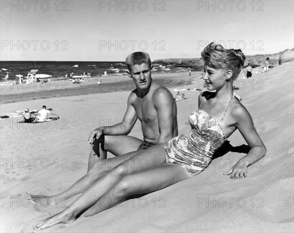 Young Adults On A Beach