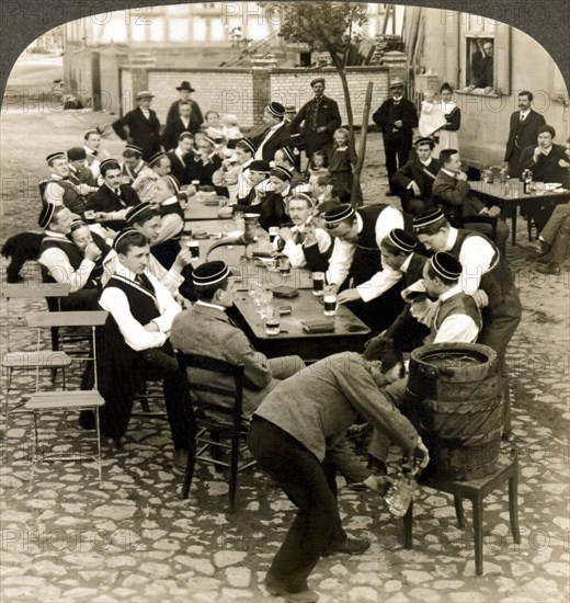 Marburg, Germany:  c. 1895.
University students from Marburg enjoying talk, song, and beer around the table at nearby Gisseleberg.