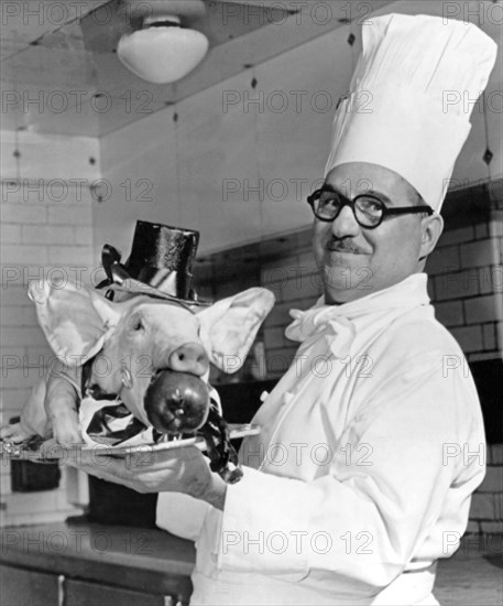 London, England:  February 28, 1961.
A roast pig, complete with top hat, tie, and tails, to be presented to Winston Churchill and his guests at the Savoy Hotel in London.