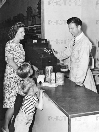 Woman Purchasing Groceries