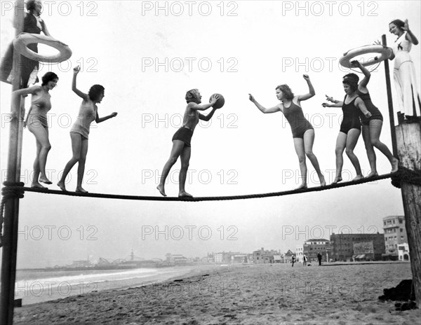 Women Play Beach Basketball