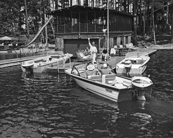 Company Arrives At The Cabin By Boat