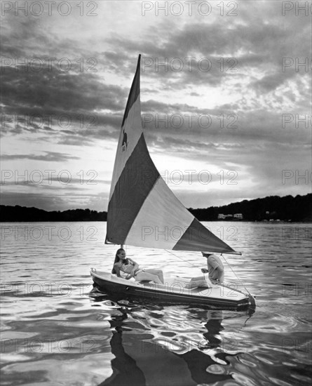 Couple Enjoys At Sunset Sail