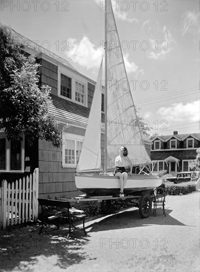 A Woman On Sailboat At Home