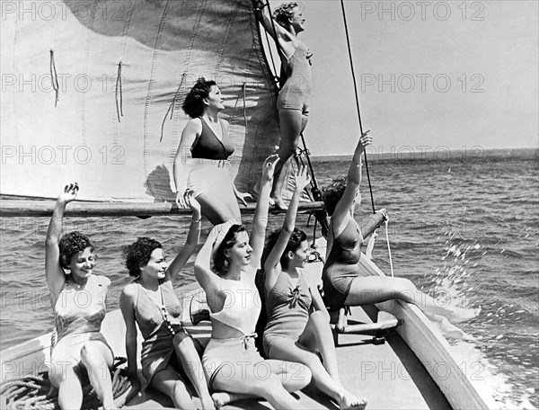 Young Women On A Sailboat.