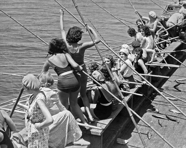 Women Fishing With Cane Poles