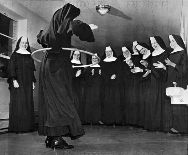 Nun Swivels Hula Hoop On Hips