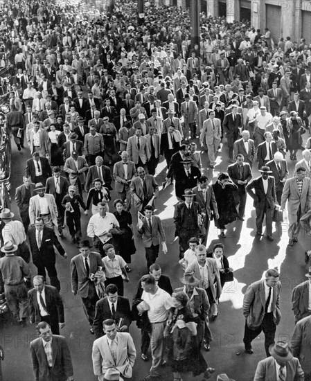 Baseball fans leaving Yankee Stadium.