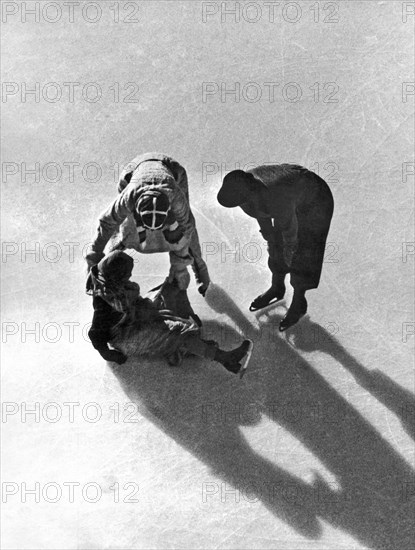 A Skater Gets Help From A Friend