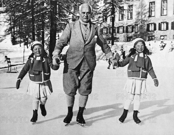 Ice Skating With A Child On Each Hand