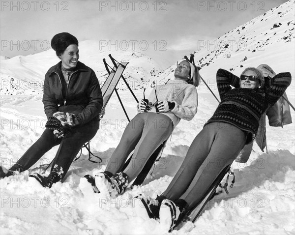 Skiers Basking In The Sun