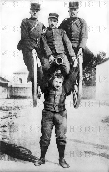 French Strongman Lifts Cannon