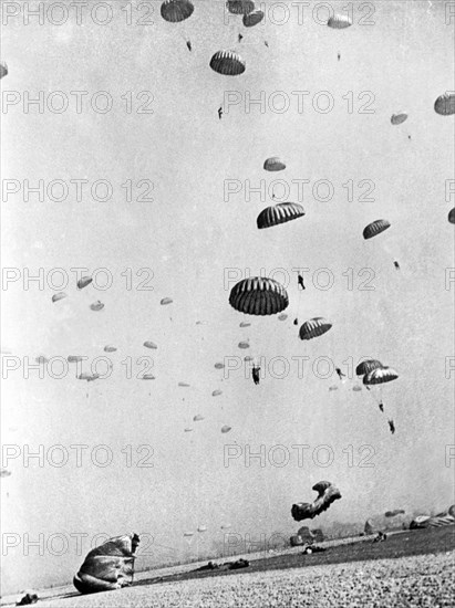 Members of the First Allied Airborne Army drop behind German positions on the far side of the Rhine.
