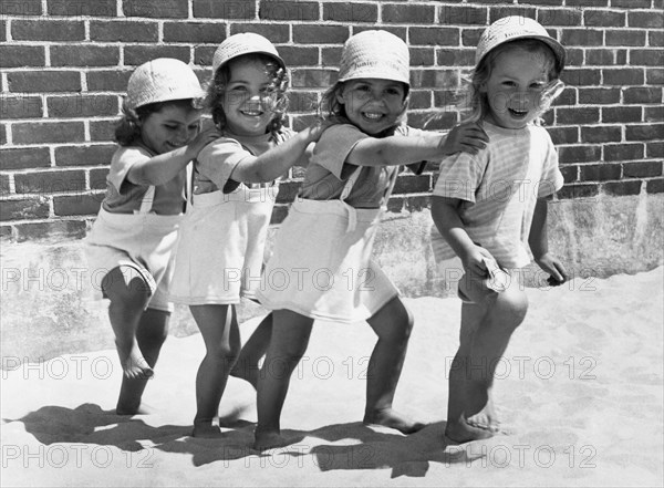 Four Little Girls Having Fun