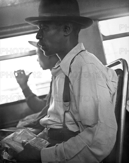 Two Black Men On A Bus