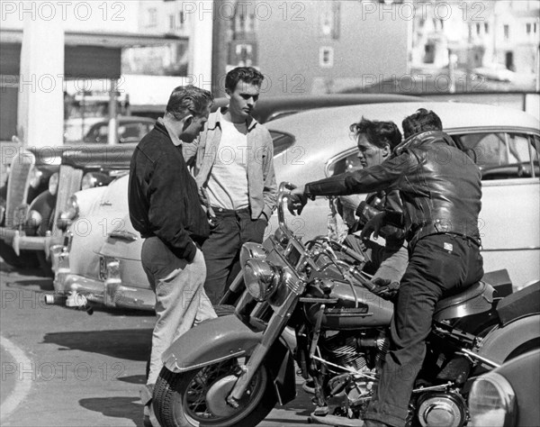 Four Youths In A Parking Lot