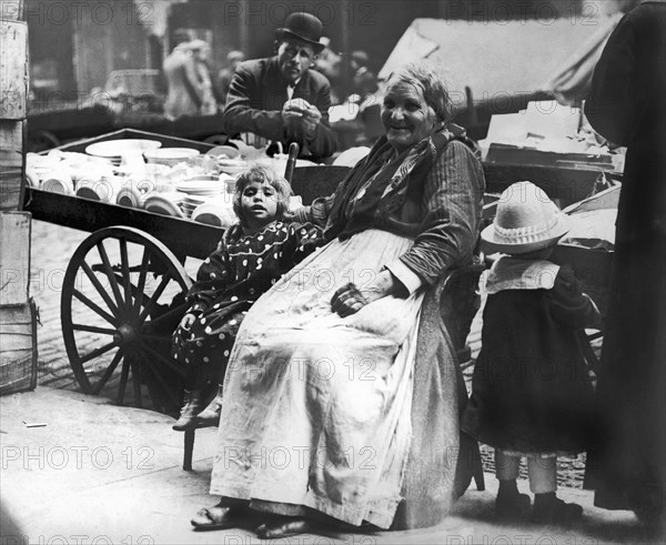 A Family And Their Push Cart