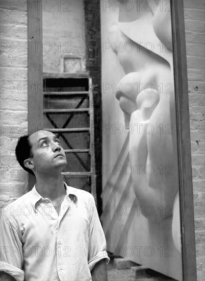 Isamu Noguchi With Sculpture