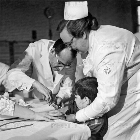 Dr.Jonas Salk Giving Vaccine