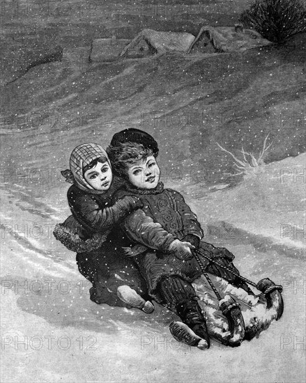 Children tobogganing