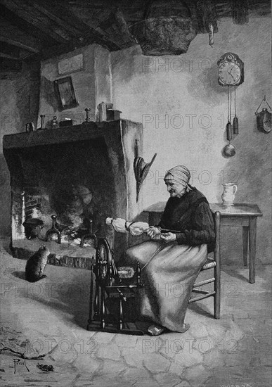 Woman spinning wool