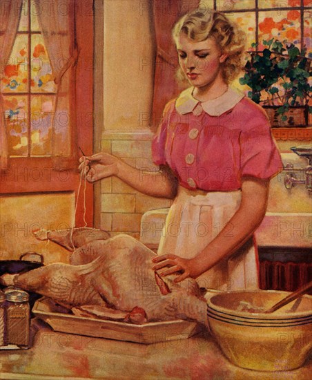 Young Mother Sews up a Turkey 1936