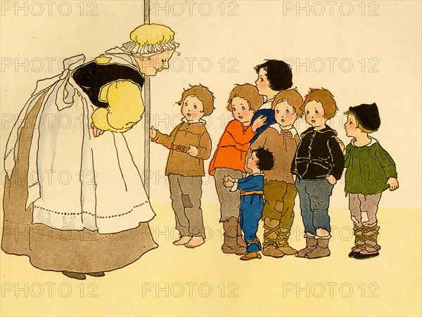 Maid Address a group of small children 1910