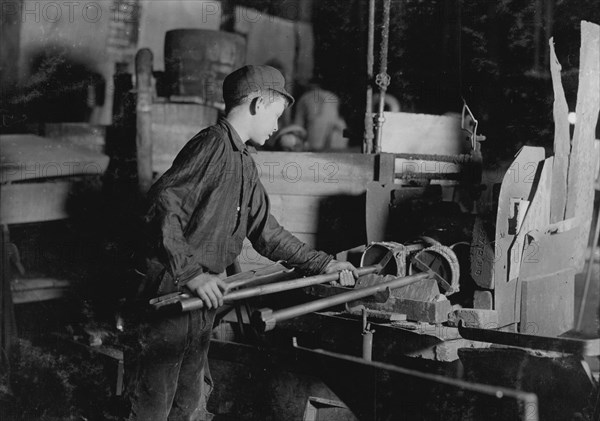 At the "Glory Hole." A midnight scene in a N.J. Glass Works. Cumberland Glass Works 1909