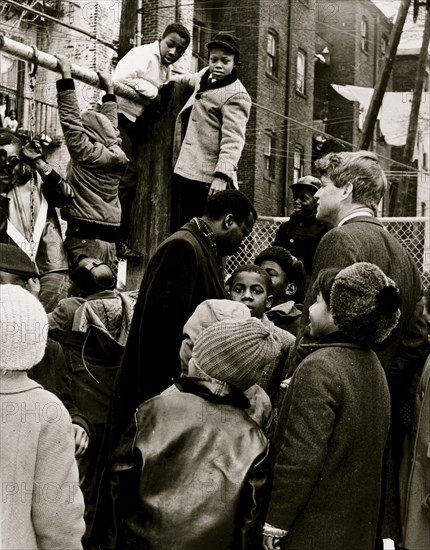 Senator [Robert Kennedy] and CBCC's Donald F. Benjamin join kids at playground 1966