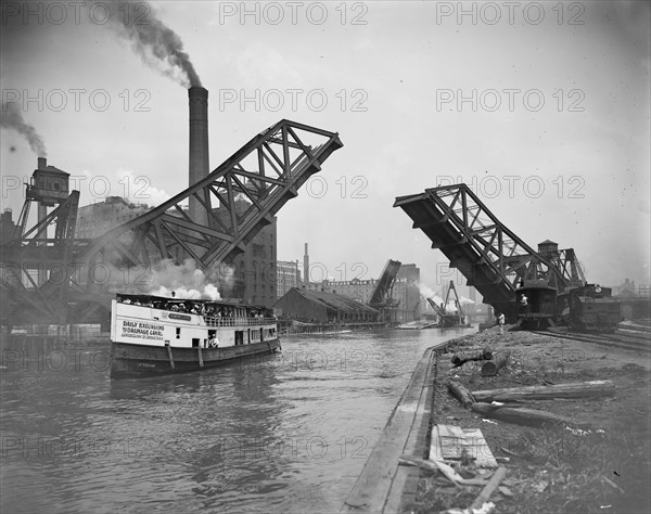 12th St. Bascule Bridge lifts to let excursion boat through 1906