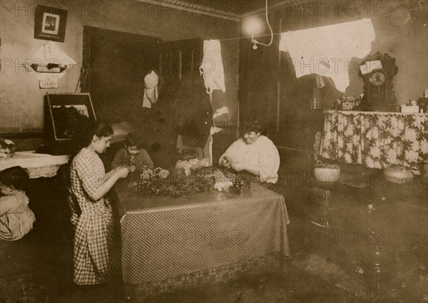 4:30 P.M. Flora Anseline, a busy girl.  She goes to school, helps mother with housework, and makes flowers, working some nights until 10 P.M.  1912