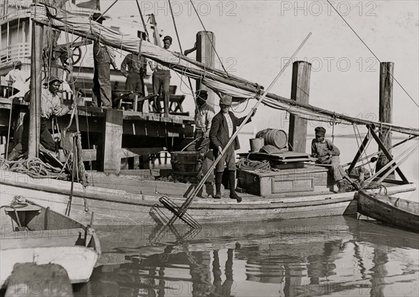 A young oyster fisher Others smaller employed in busy season. Apalachicola, Fla. 1909