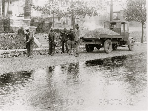 African American men paving road, Washington, D.C. 1915