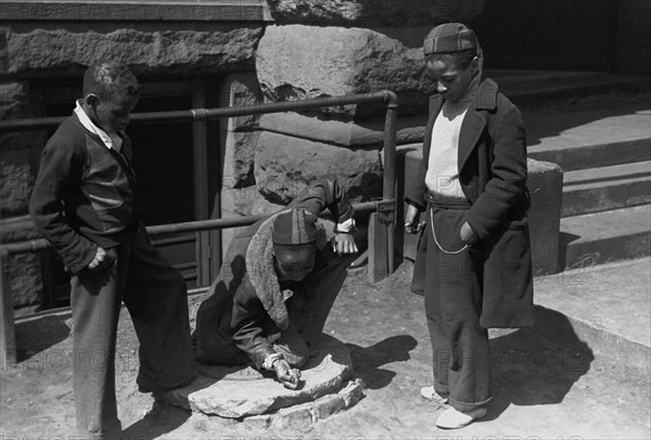 African American play marbles on the South Side of Chicago 1938