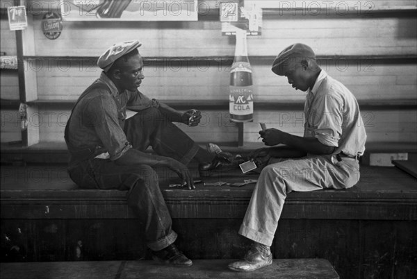 African American Playing cards on a bench 1938