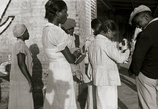 African American Residents of Amite City, Louisiana on their way to church 1935