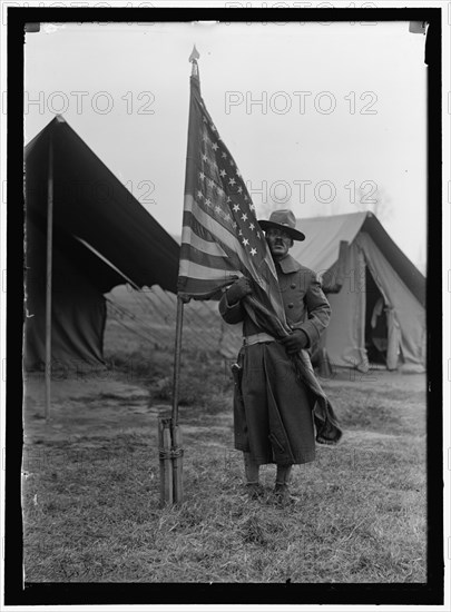 African American soldier embraces the Stars & Stripes 1917