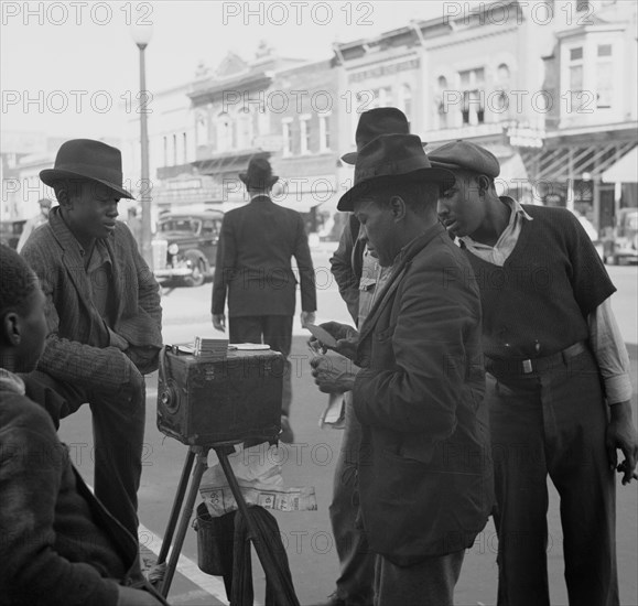 African American Street photographer. Smithfield, North Carolina 1938