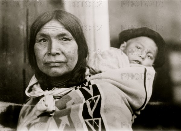 American Ind. woman with child in papoose