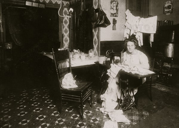 Jewish woman manufactures lace from their tenement apartment 1911