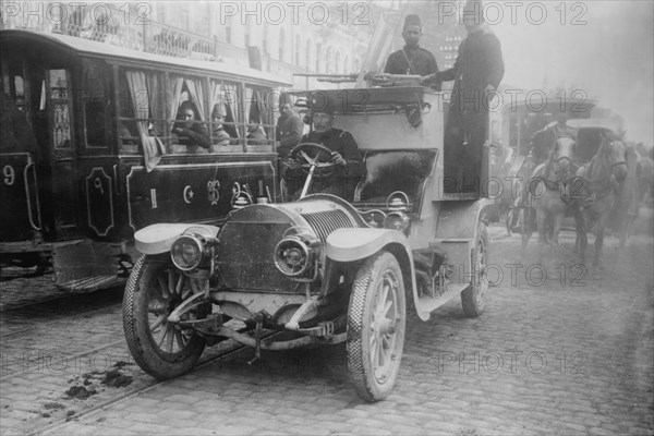 Armored Automobile juxtaposed with Trolley Car & Horse Team on a City Street in Turkey 1916