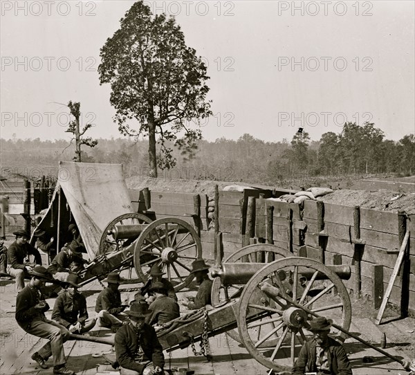 Atlanta, Ga. Federal soldiers relaxing by guns of captured fort 1864