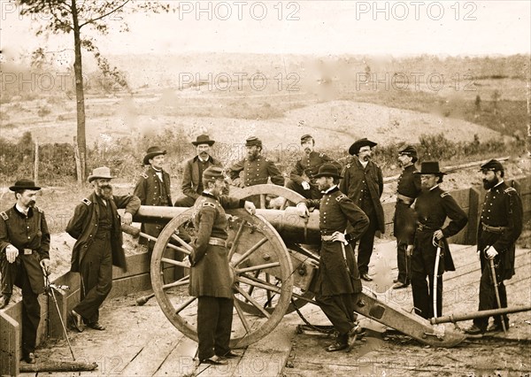 Atlanta, Ga. Gen. William T. Sherman, leaning on breach of gun, and staff at Federal Fort No. 7 1864