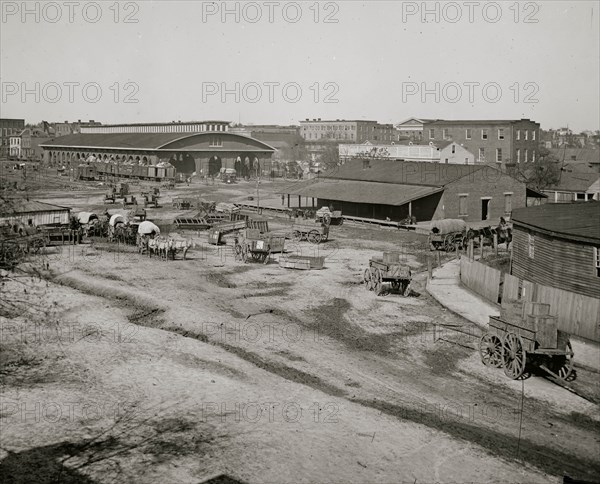 Atlanta, Ga. Railroad depot and yard; Trout House and Masonic Hall in background 1864