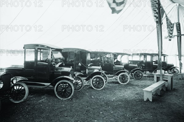 Automobiles on Display in Showroom Interior 1921