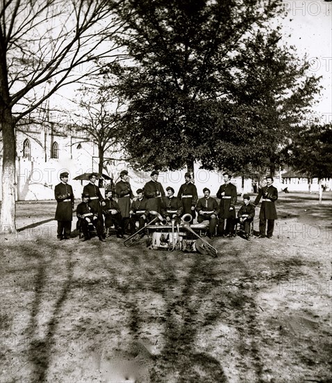 Band group seated behind their instruments 1863