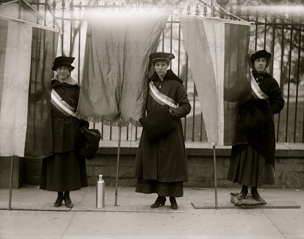 Banners in font of the White House Gates 1913